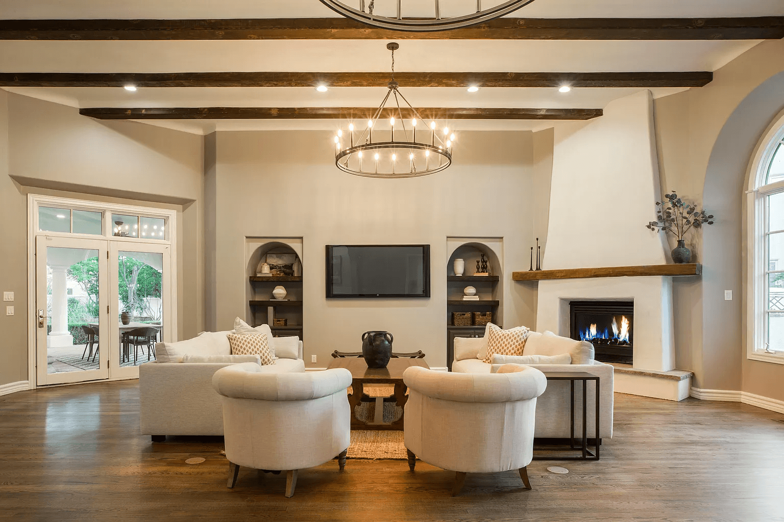 A living room filled with furniture and a fireplace.