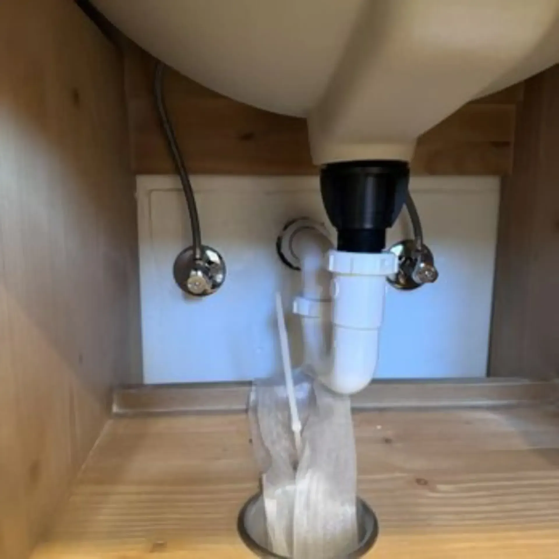 Pipex Plumbing - A bathroom sink with a drain underneath it