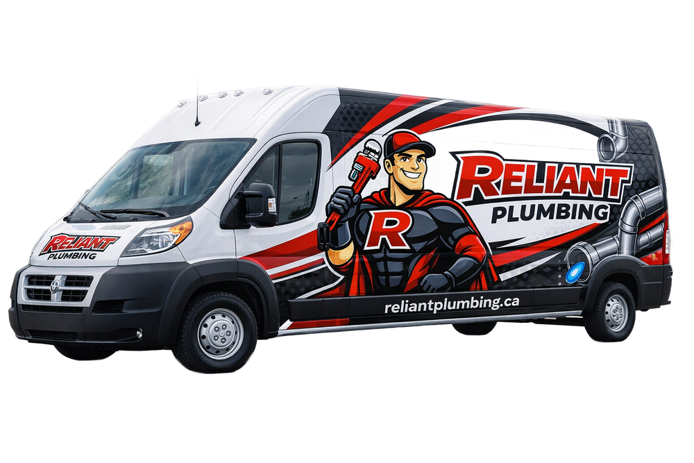 Reliant Plumbing van with a superhero plumber graphic, red/black/white design.