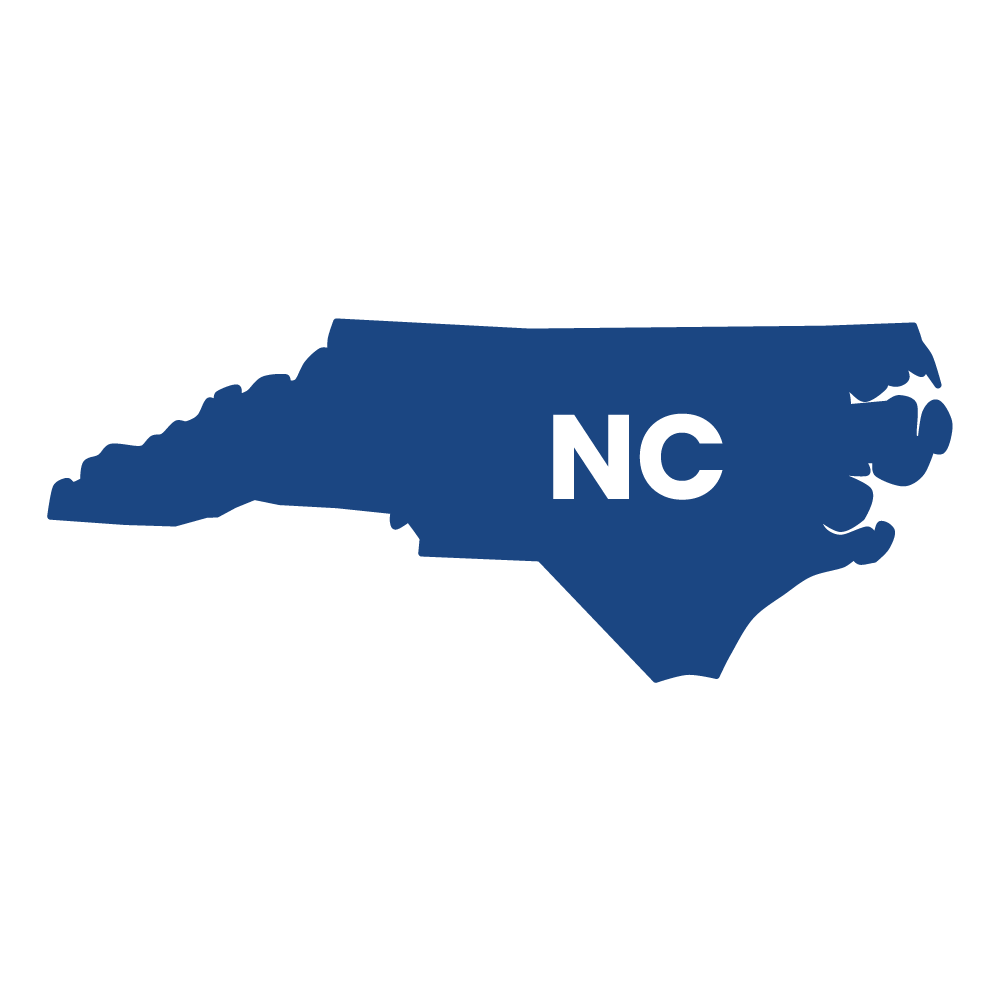 Blue silhouette of North Carolina with white “NC” centered on a white background