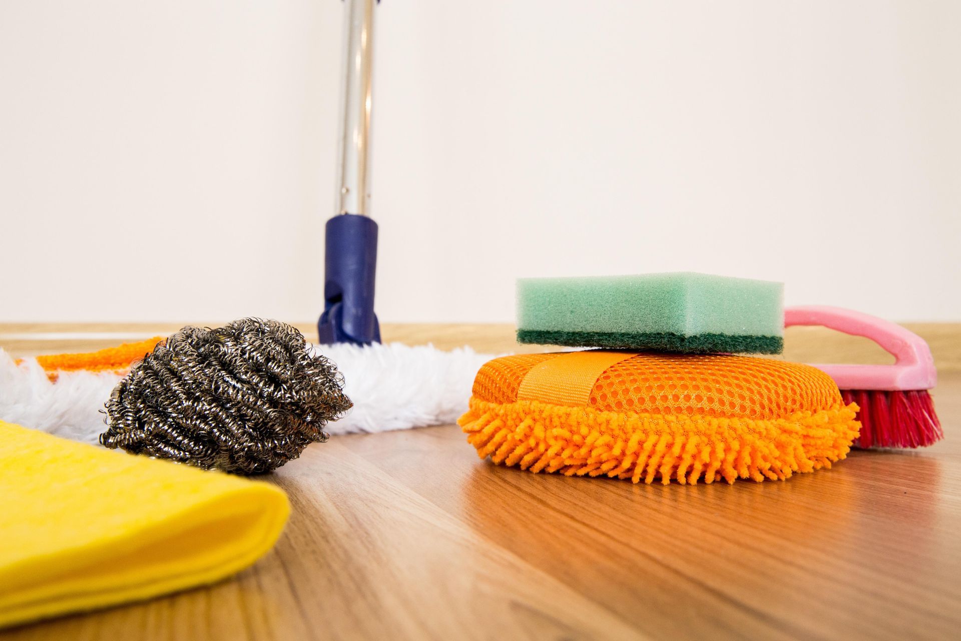cleaning sponges and brushes and mop with brillo pad