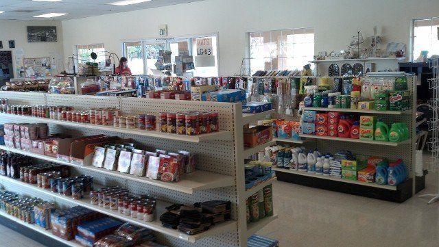 A grocery store filled with shelves filled with lots of products.