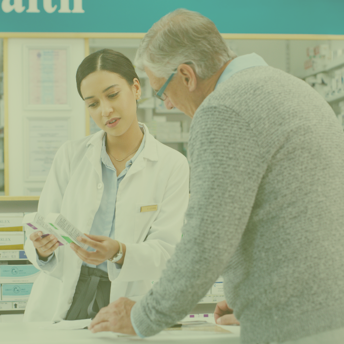 Pharmacist assisting Country Store and Pharmacy customer
