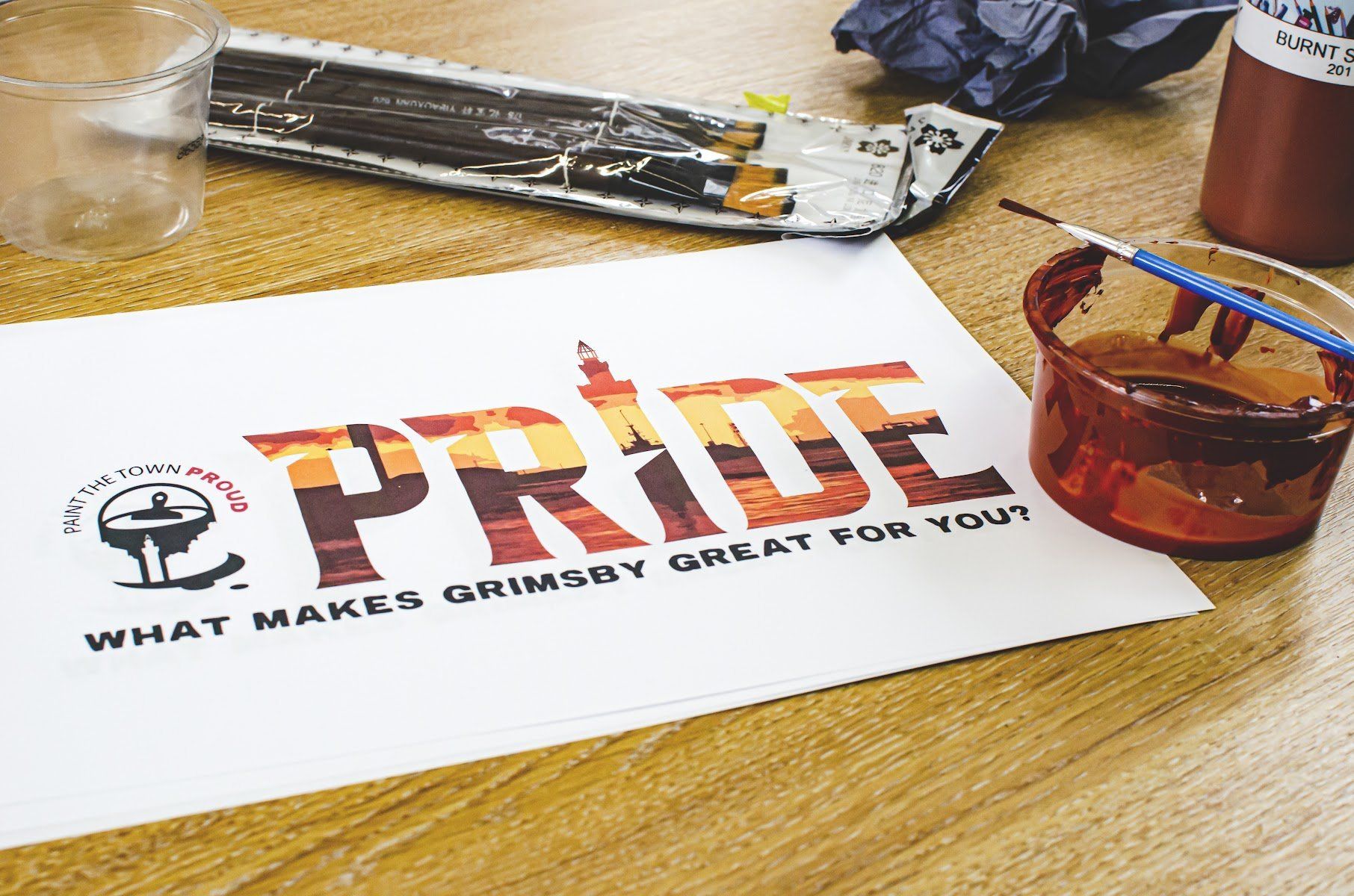 A piece of paper with the word pride on it