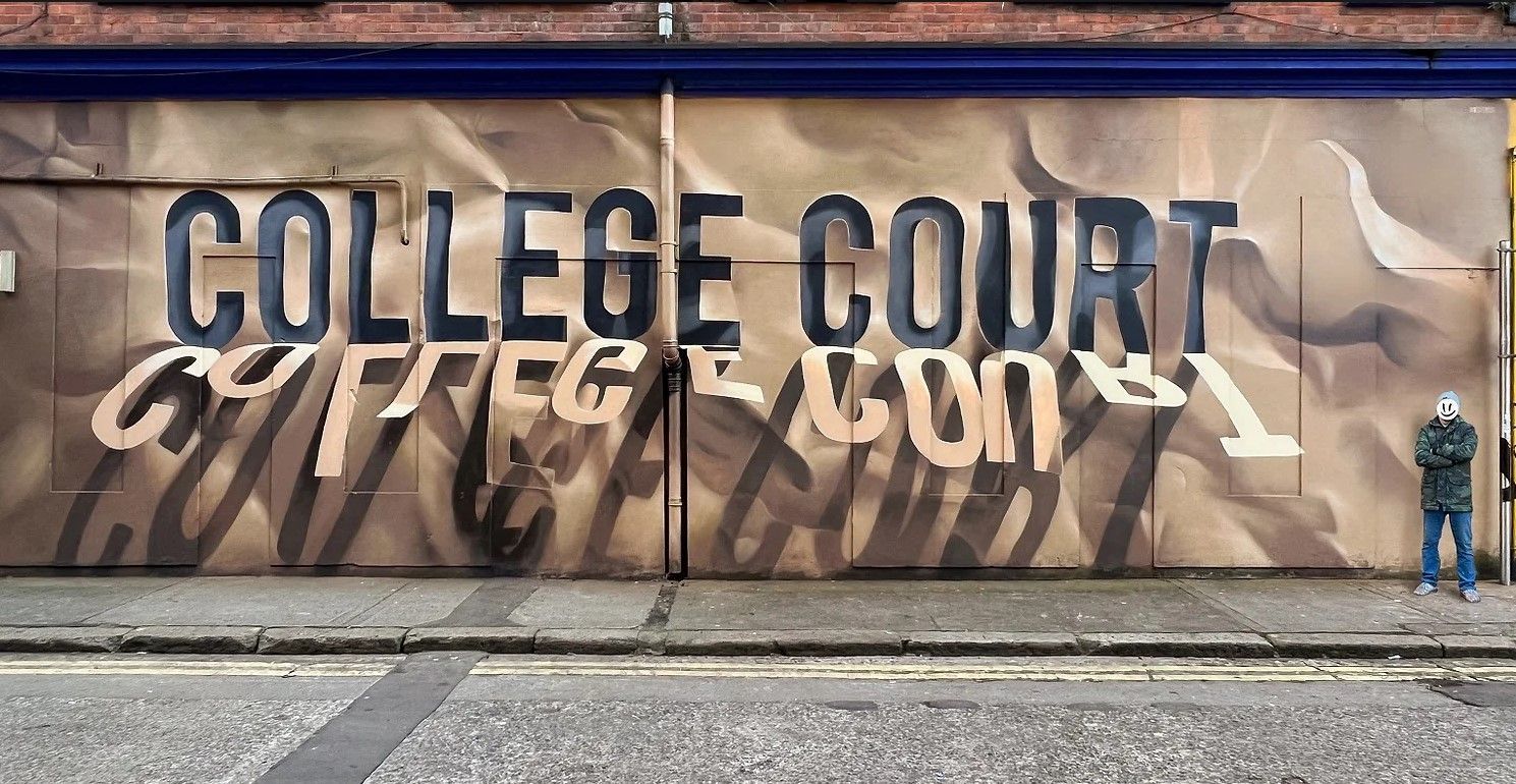 A wall with the words college court written on it