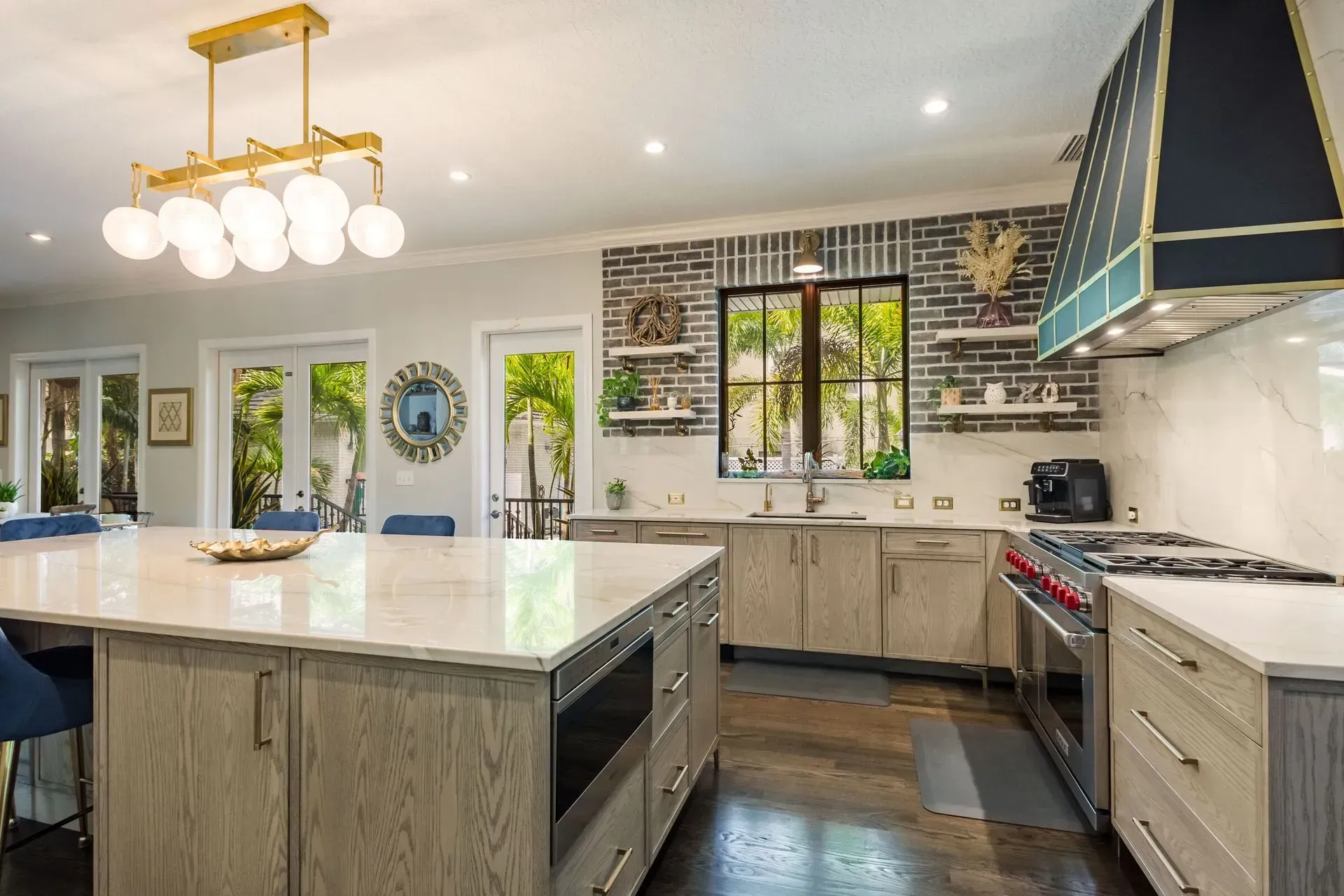 There is a large island in the middle of the kitchen.