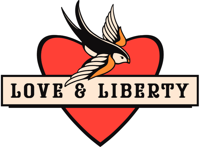Love & Liberty logo with a red heart, flying bird, and banner text