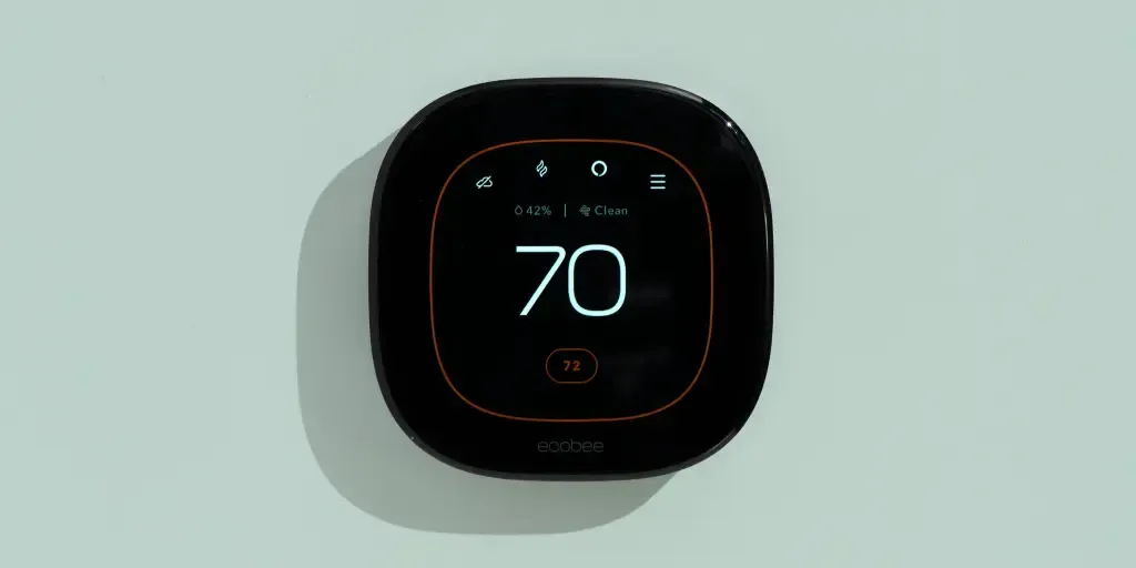 Photo of a smart thermostat set to 70 degrees. Photo of a smart thermostat set to 70 degrees.
