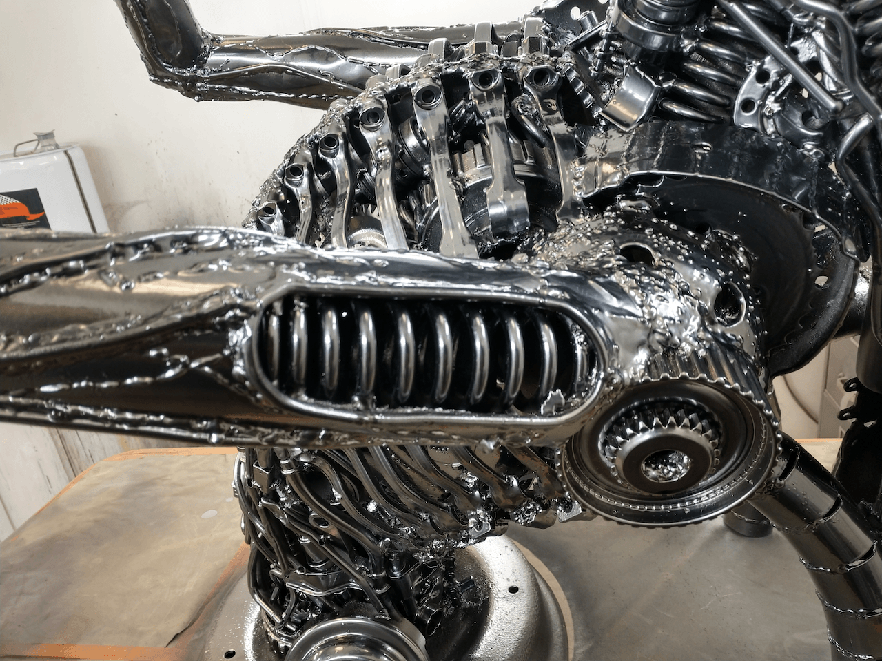 A close up of a metal sculpture on a table