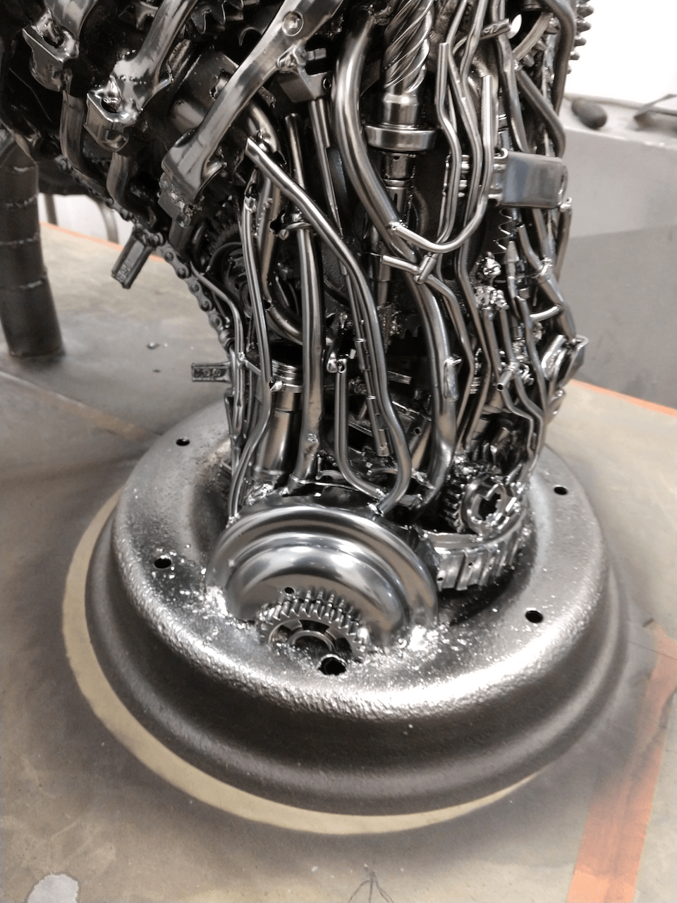 A close up of a metal sculpture on a table