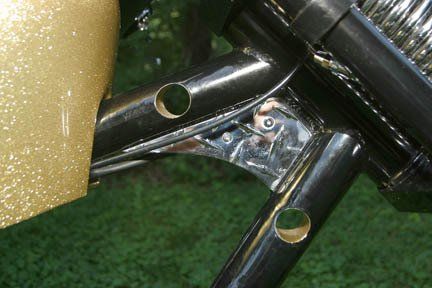 A close up of a metal object with holes in it