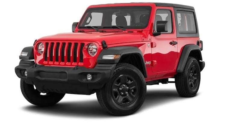 Red Jeep Wrangler with a black hardtop.