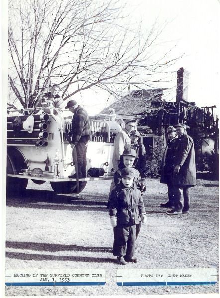 A black and white photo of a fire truck