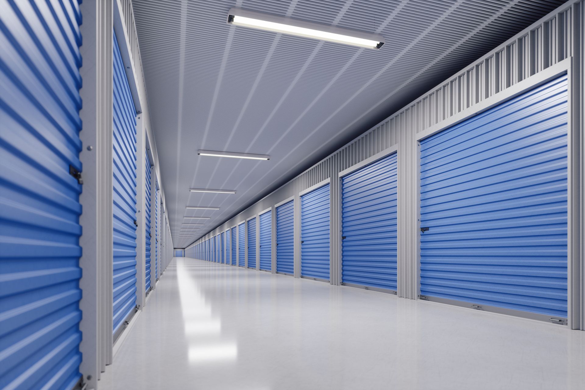 A long hallway filled with rows of blue storage units.