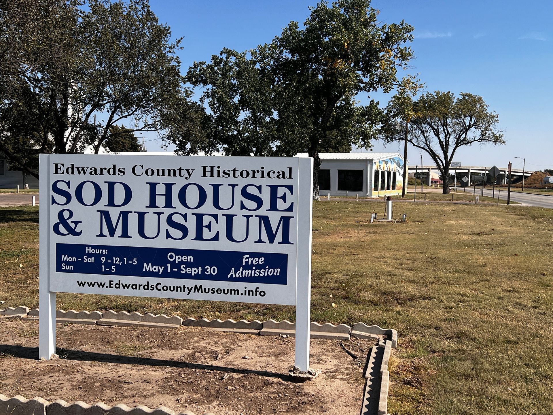 A sign for the sod house and museum in edwards county