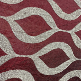 Red and white wavy patterned fabric close-up