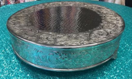 Turquoise and silver decorative metal bowl with ornate engraved floral patterns
