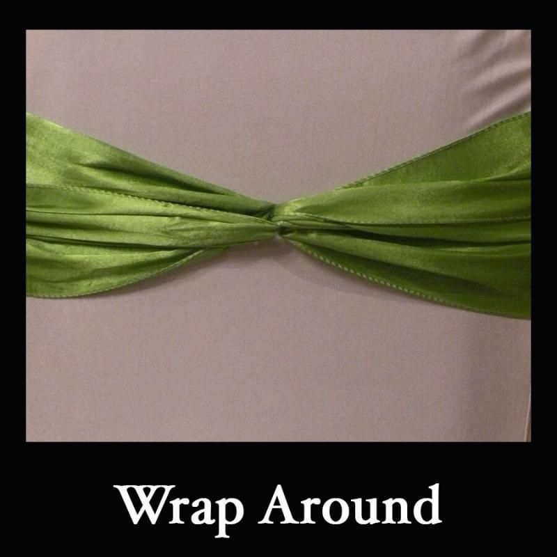 Green ribbon wrapped around a gray background, forming a knot in the center.