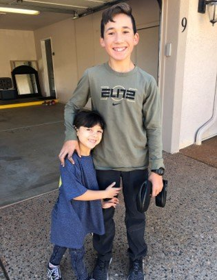 Two Boys Smiling — Whittier, CA — Trinity Realty & Trinity Home Loans Inc.