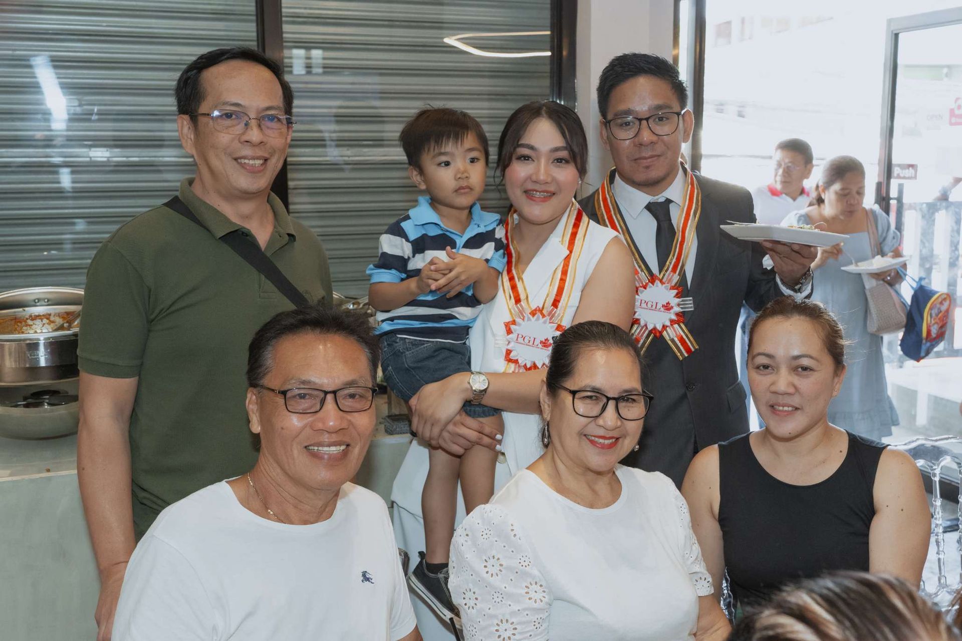 A group of people are posing for a picture together.
