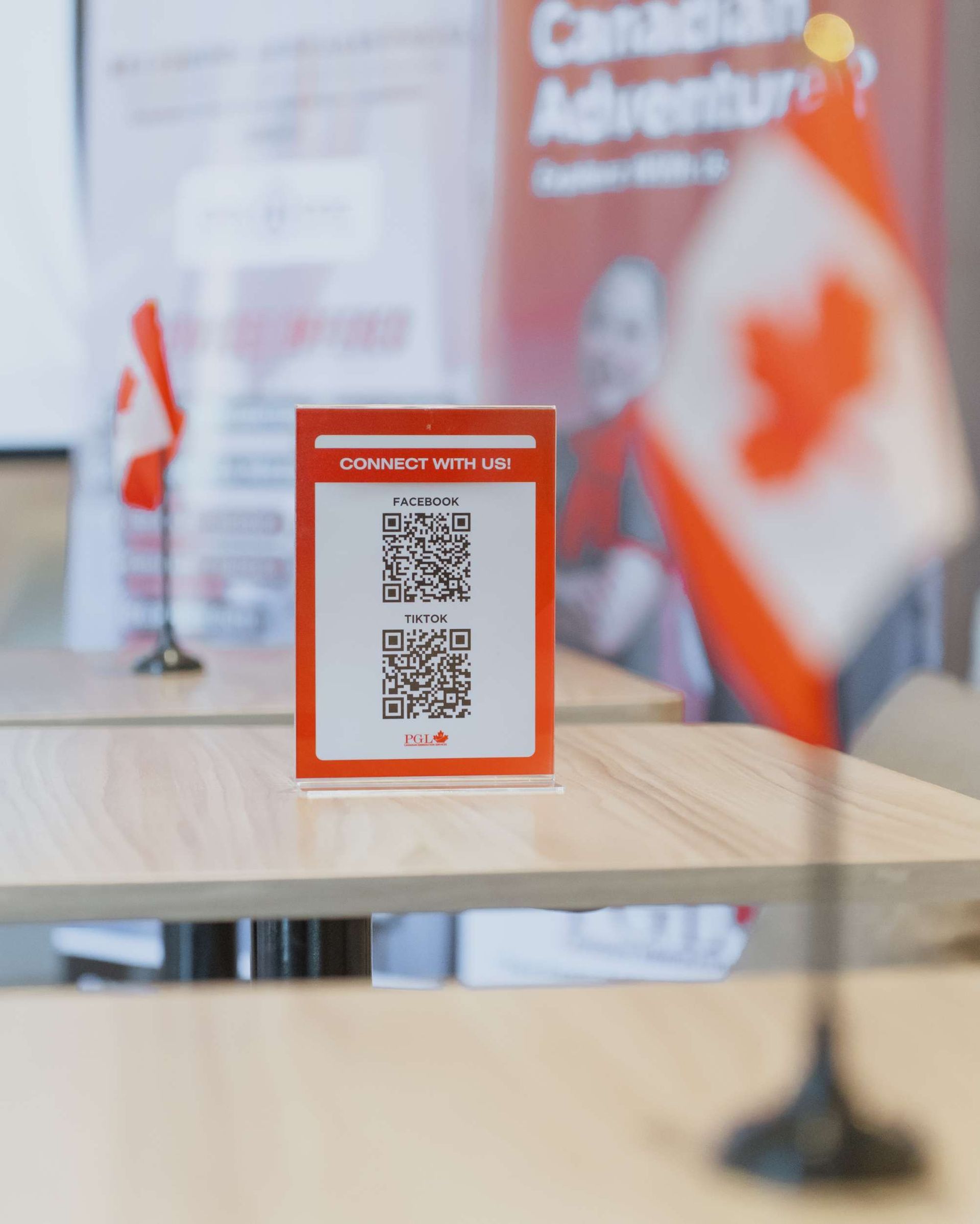 A sign on a table that says canadian adventure