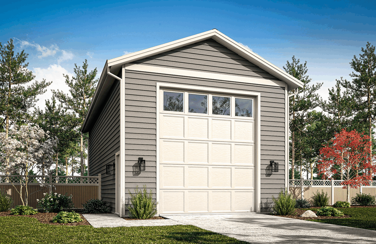 Small gray garage with a white door, front walkway, and landscaped yard under a blue sky