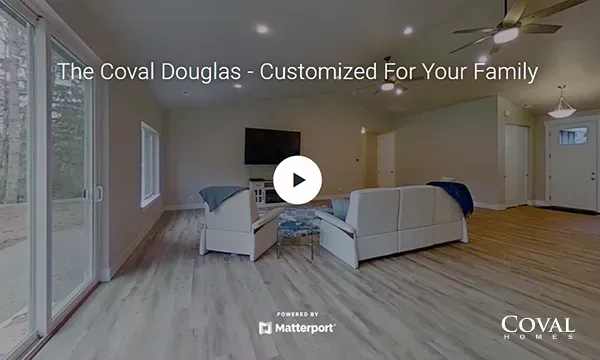 Bright open-concept living room with beige sofas and hardwood floors in a real estate tour thumbnail with play icon