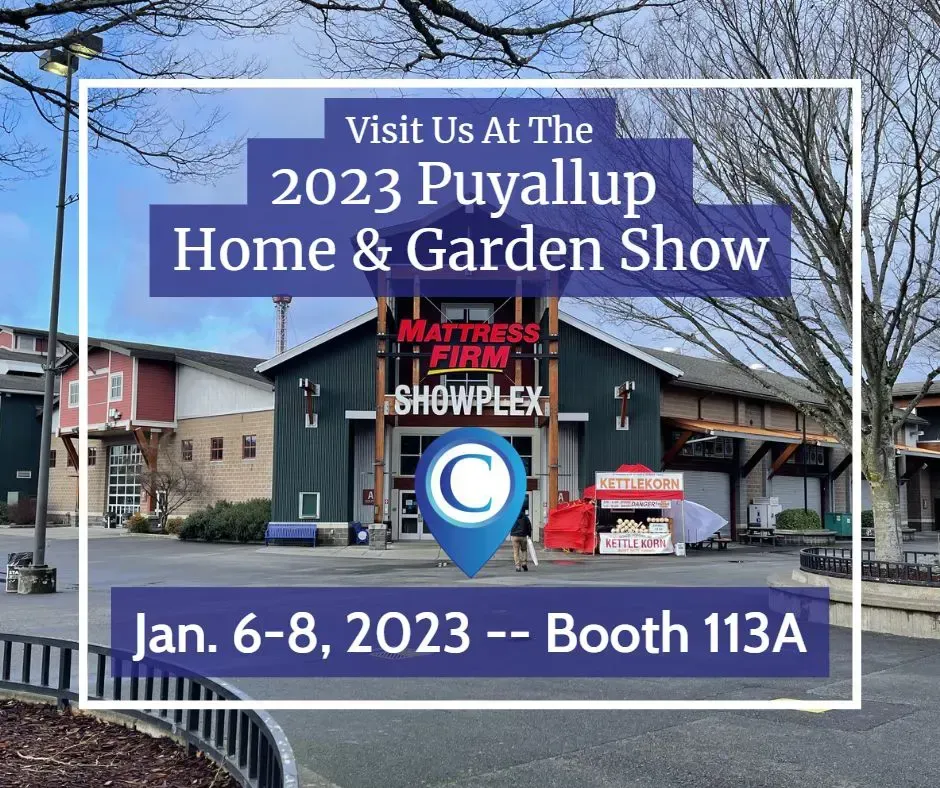 Sign for 2023 Puyallup Home & Garden Show, Jan. 6-8, Booth 113A, on storefront background