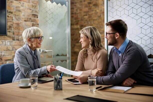 Attorney with client for a contract to look