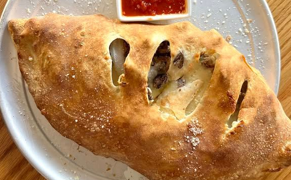 Calzone and sauce Calzone and sauce