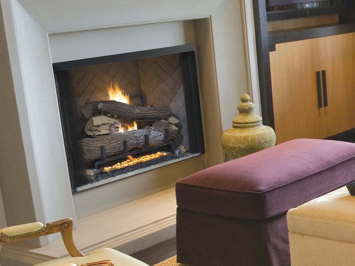 A living room with a fireplace and a bench. A living room with a fireplace and a bench