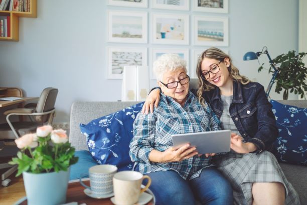 mother-with-daughter-looking-at-ipad