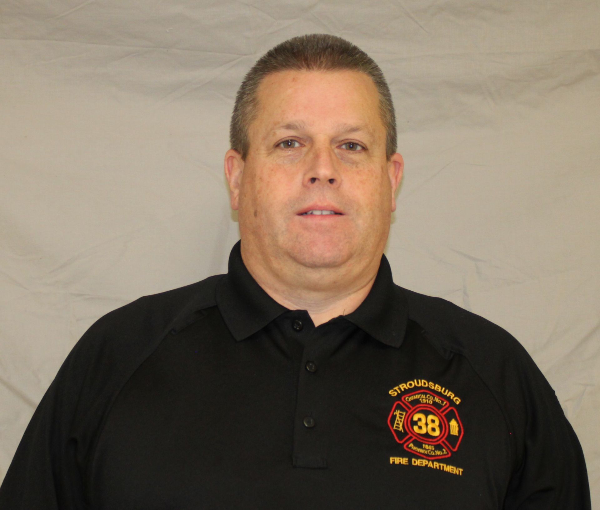 Man in black uniform with 