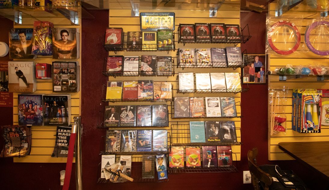 A wall with a lot of dvds on it