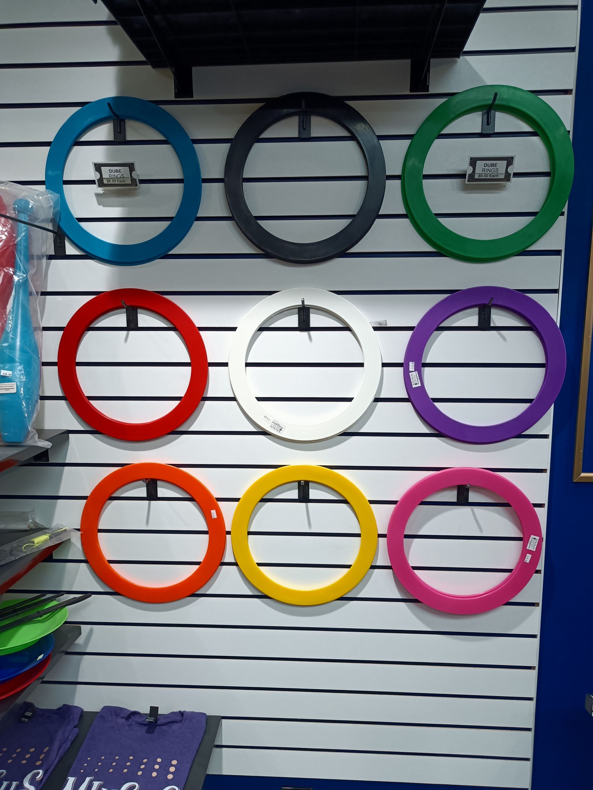 A wall with a bunch of colorful circles on it