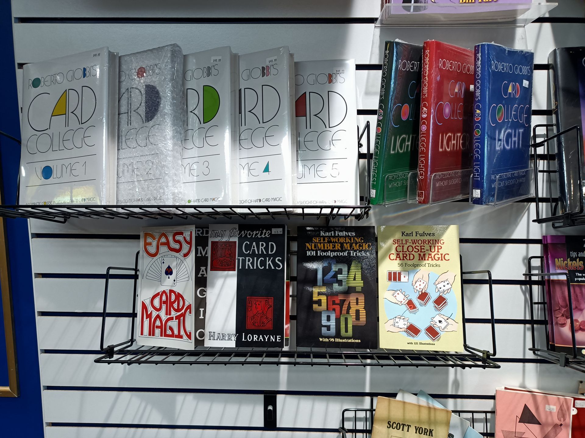 A shelf full of books including one called easy card ideas