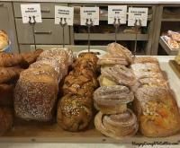 Pastries on display with labeled cards.