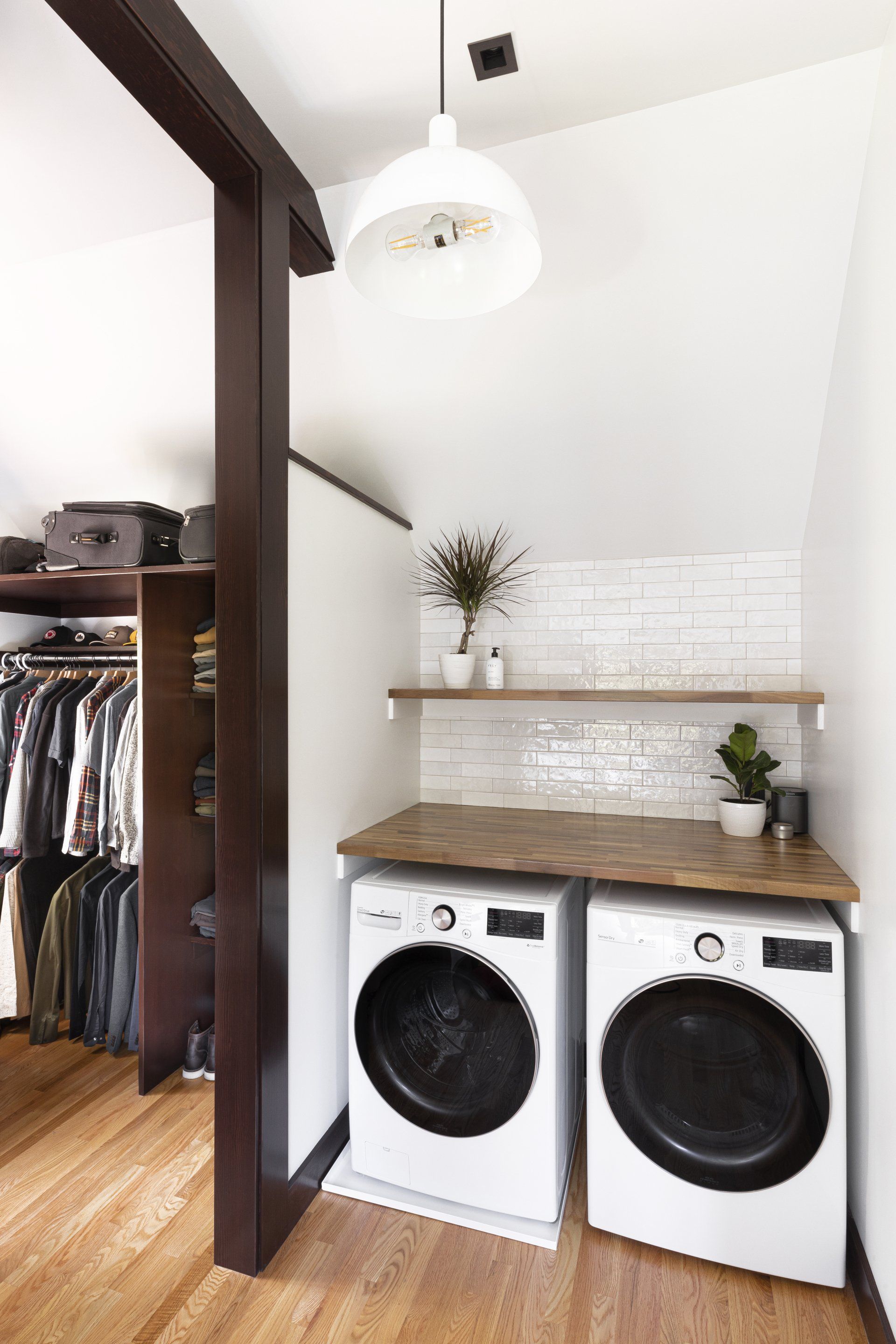 The laundry space and main closet sit right off the main bathroom. 