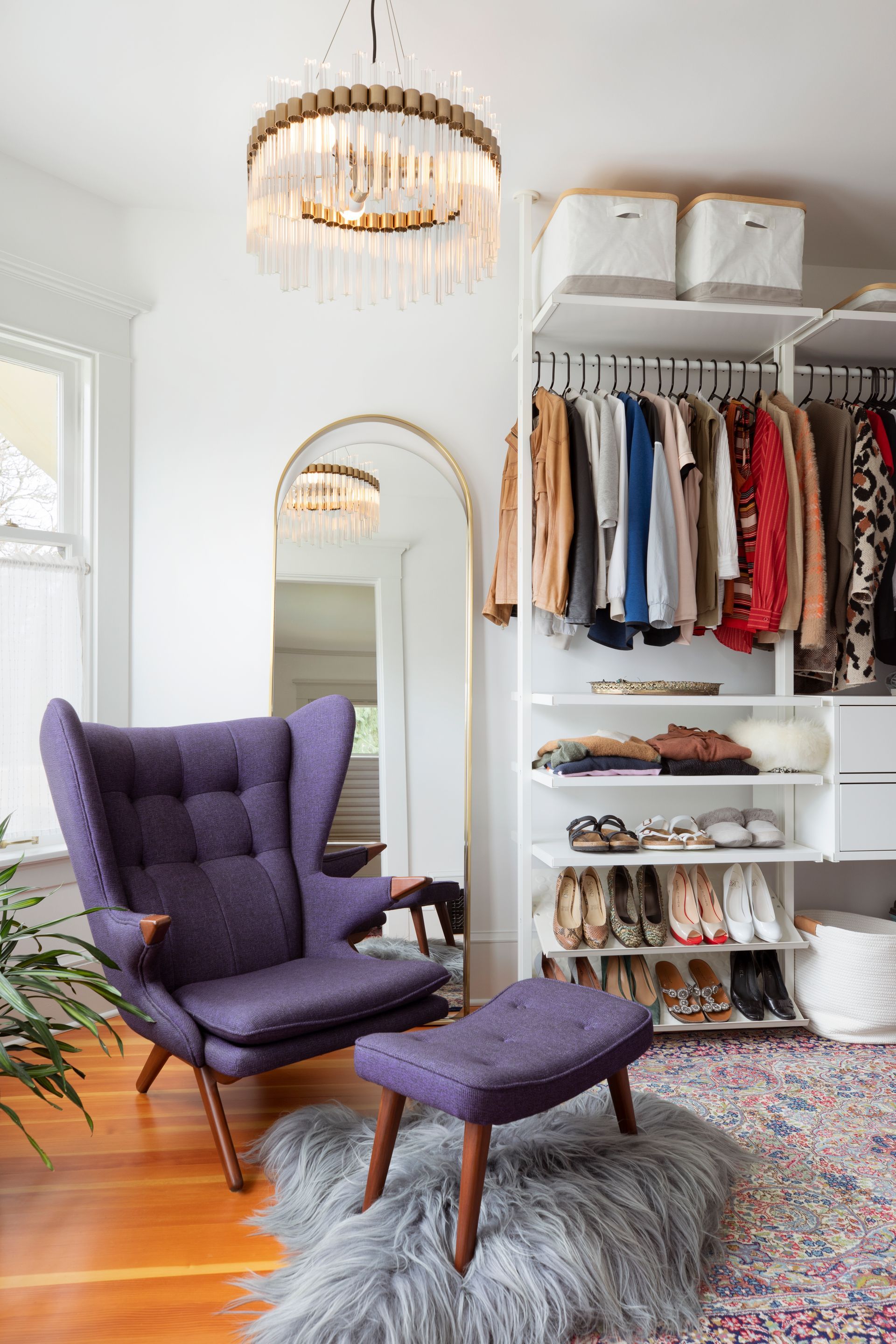 A fun walk-in closet doubles as a dressing room in the former bathroom.