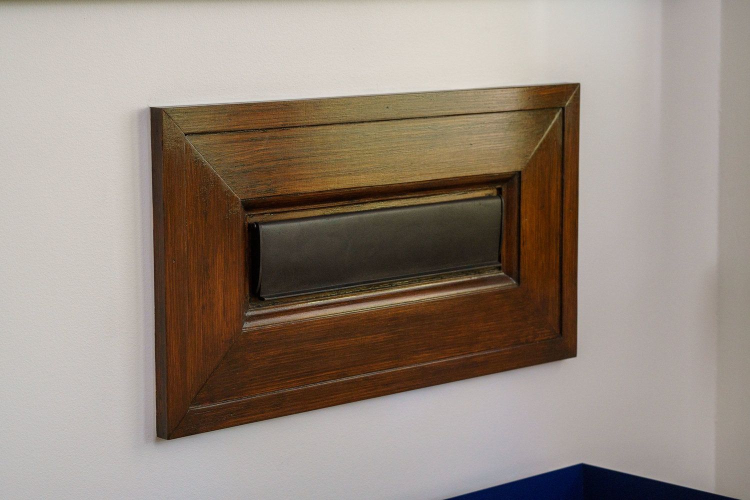 The mailslot conveniently empties at the foot of the main stairs.