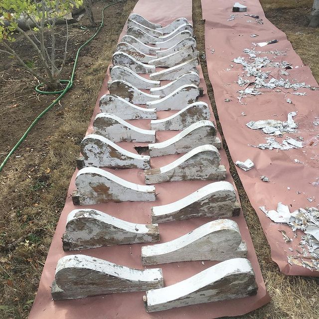 A row of concrete pieces are lined up on a table