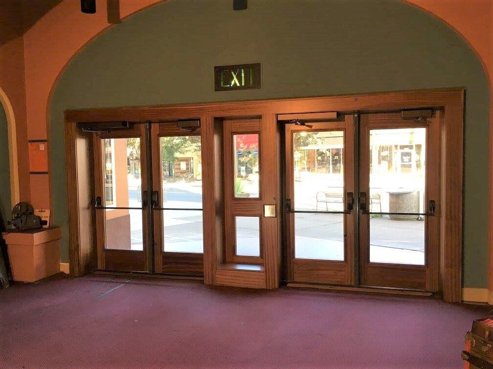These custom doors were modeled after the 1926 originals, but offer ADA accessibility, energy efficiency and safety