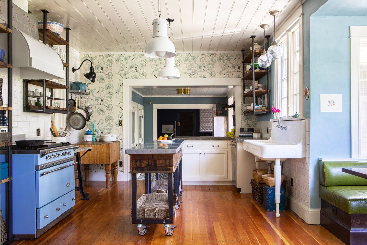 In this 1909 Sellwood Bungalow, Arciform worked closely with the client to express her eclectic taste when creating this vintage-style unfitted kitchen. 