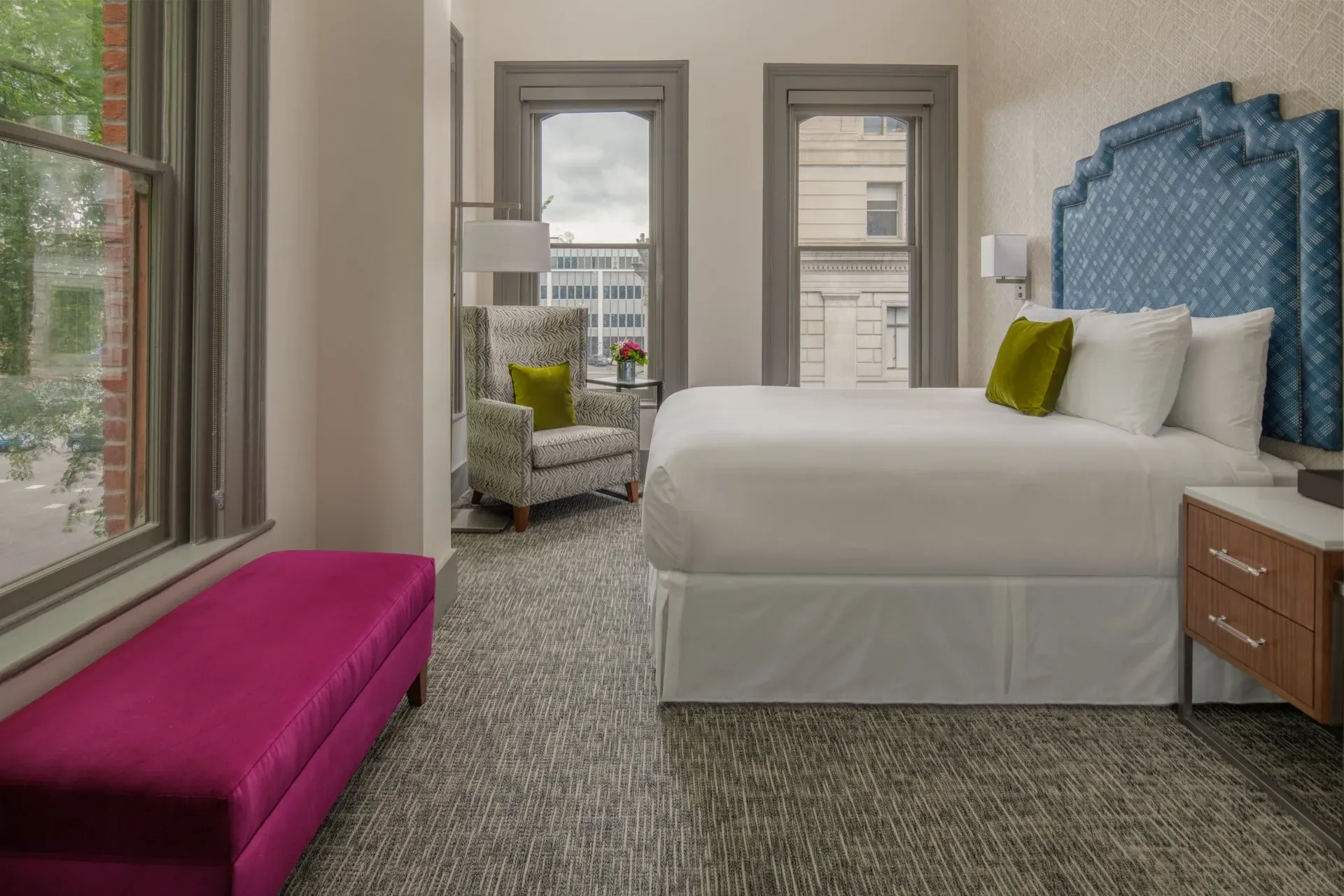 A deluxe corner room with Arciform’s restored sash