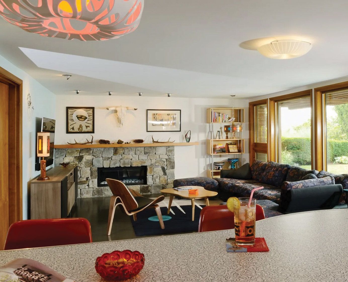 A living room with a fireplace and a couch