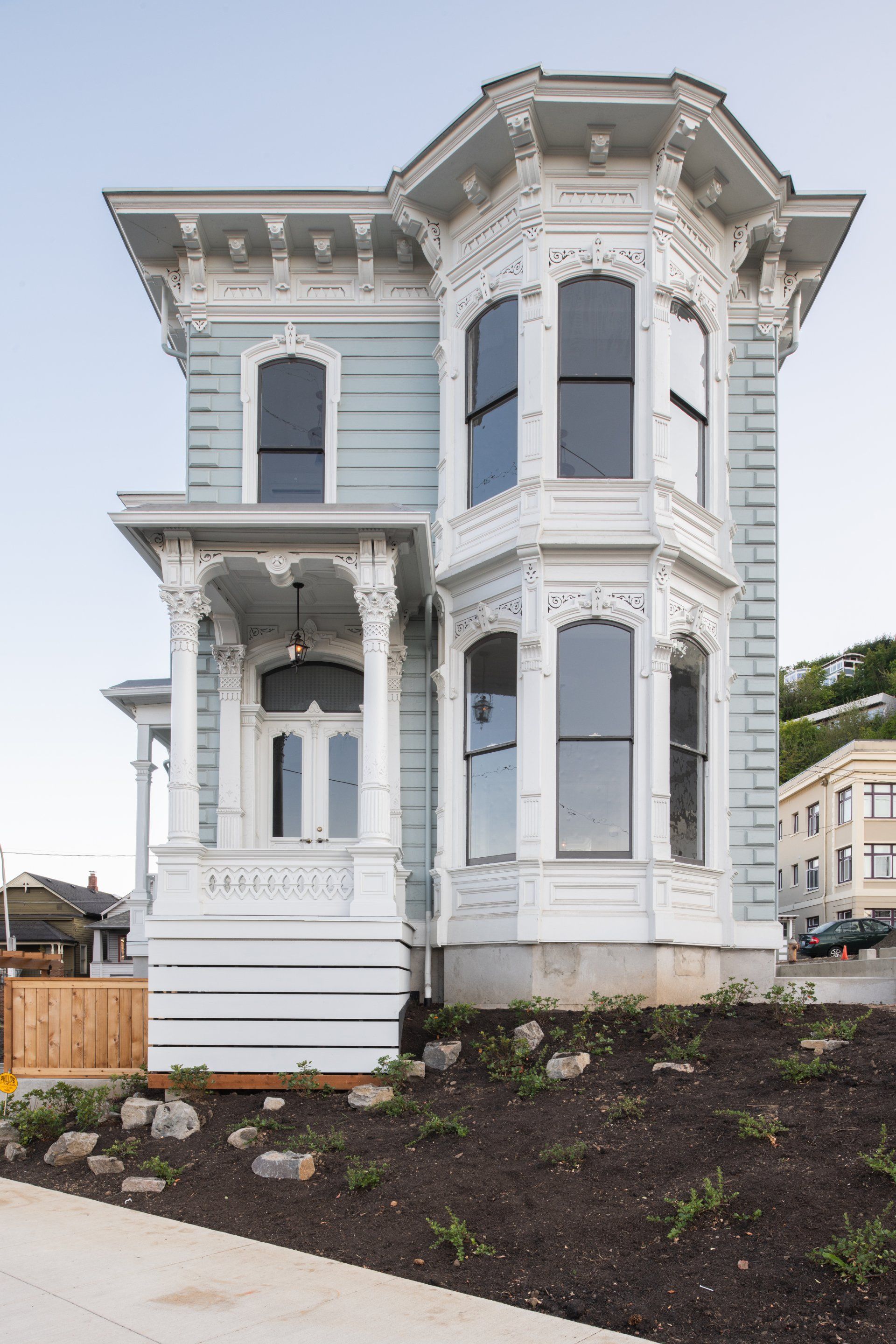 On its new site, the Fried-Durkheimer House can be admired from all sides. The restored and reproduced architectural details, from decorative brackets at the eaves and columns, bay windows with carved or molded window caps and quoining at the outer corners, can all be enjoyed from a walk around the block. Photo by Erin Riddle of KLiK Concepts.