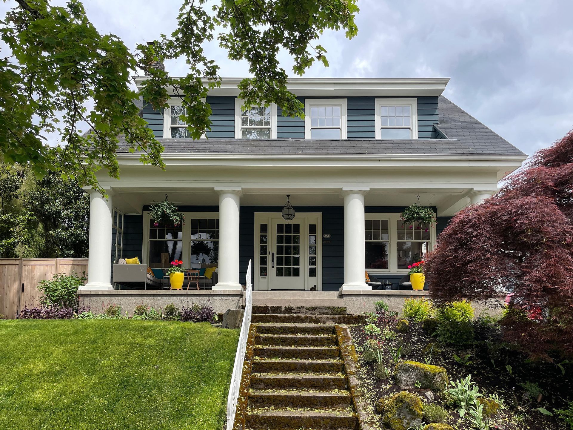 1918 Laurelhurst Dutch Colonial with mudroom and garage addition by Arciform.