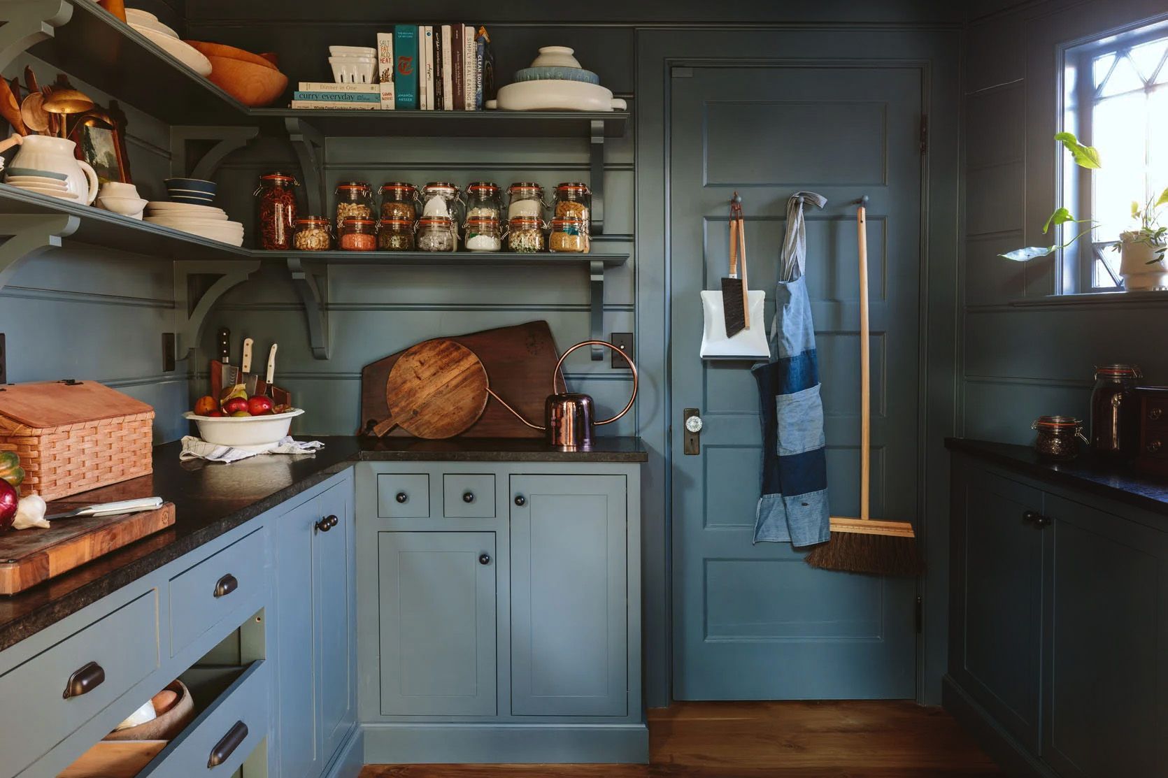 The new walk-in pantry of this 1910 SW Portland farmhouse does double duty as a side entry. 