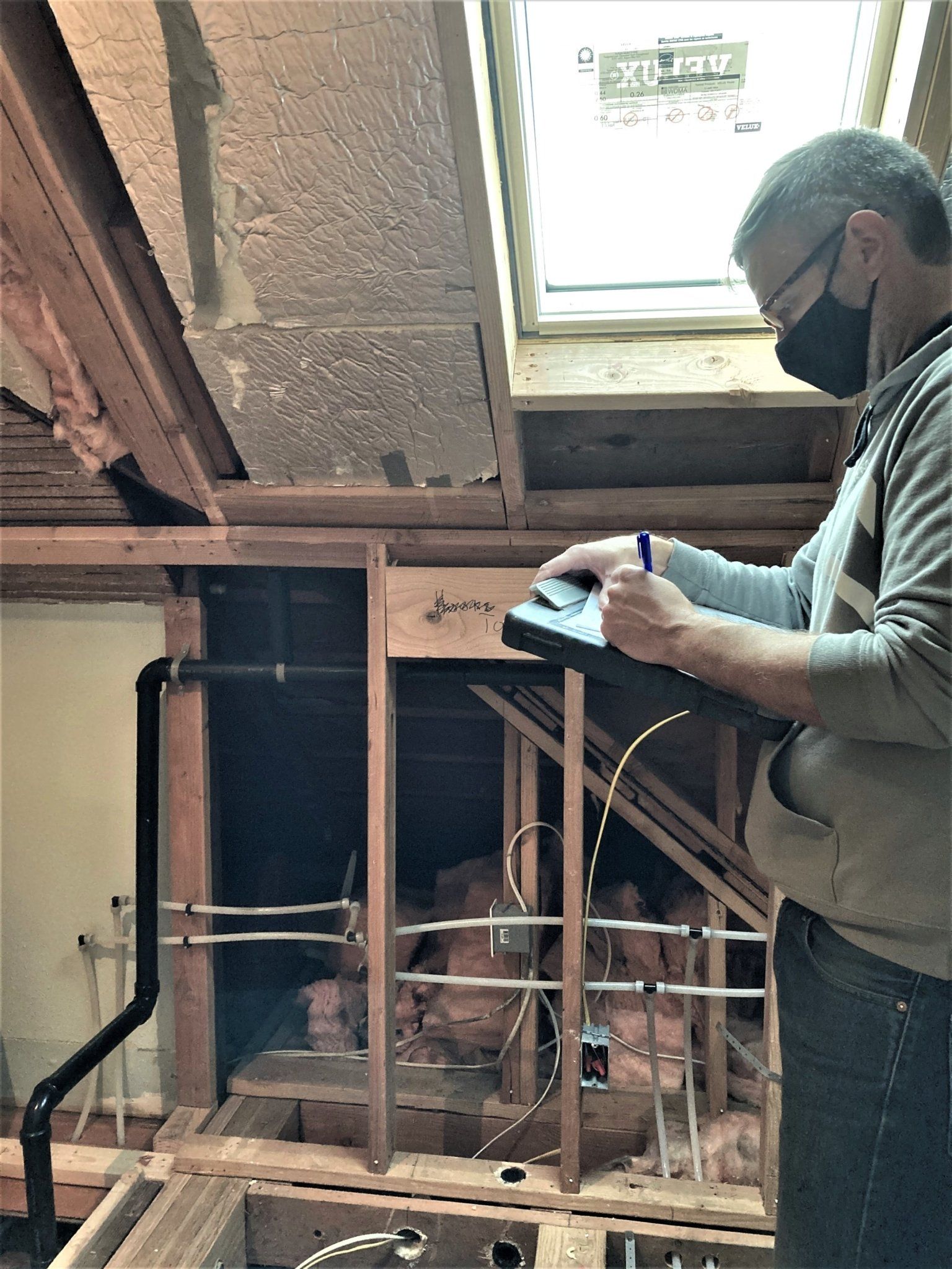 PM Joe McAlester checks a new bath’s progress before tile installation