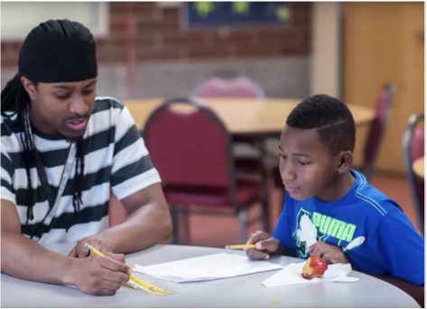 A teacher and student at Serendipity Center